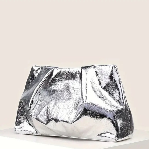 Anthropologie Handbags - NWOT Silver Metallic Clutch